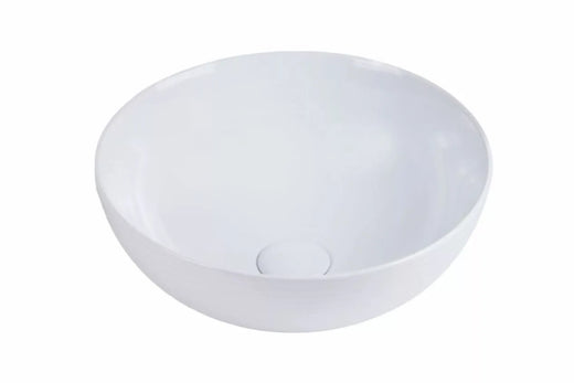 Witte keramische opbouwwaskom, rond model, op een badkamermeubel